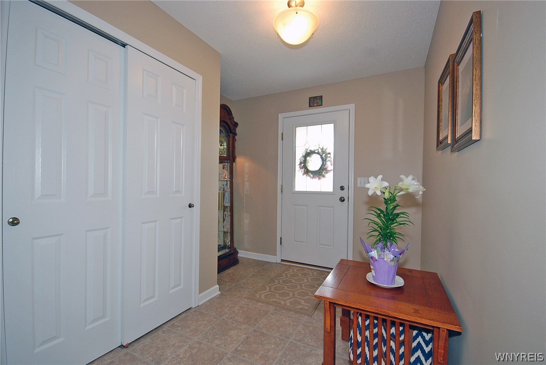 65 Hanover Street Lancaster, NY 14086 - Photo 2 of 25 Entrance foyer with large closet