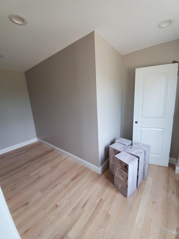 Lot 2 Cabot Road Westfield, MA 01085 - Photo 21 of 29 a room with furniture and wooden floor