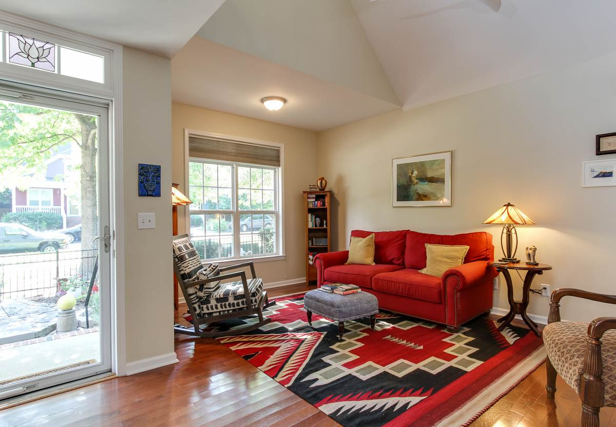 225 Cooke Street Raleigh, NC 27601 - Photo 6 of 24 Beautiful Living area with high ceilings, impressive stairwell and custom blinds. Gorgeous Living area with impressive high ceilings
