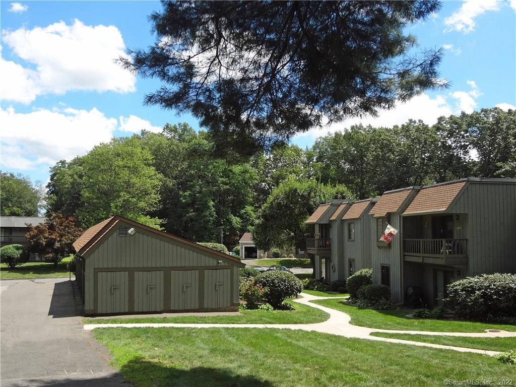 56 Village Road, Unit 56 Southington, CT 06489 - Photo 1 of 1 Open, Second Floor Unit (with flag) - No neighbors above. Full Garage in Front of Unit