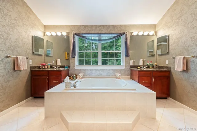 a dining table with sink and mirror
