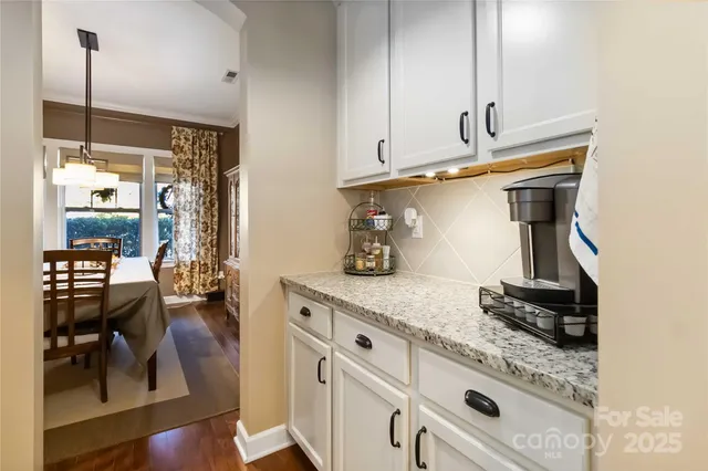 a kitchen with appliances and cabinets