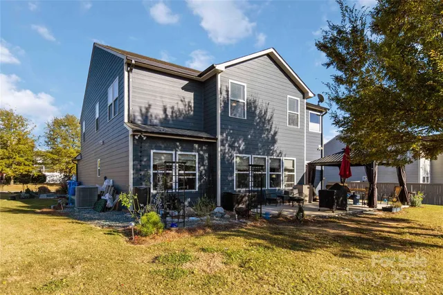 a view of a house with a swimming pool