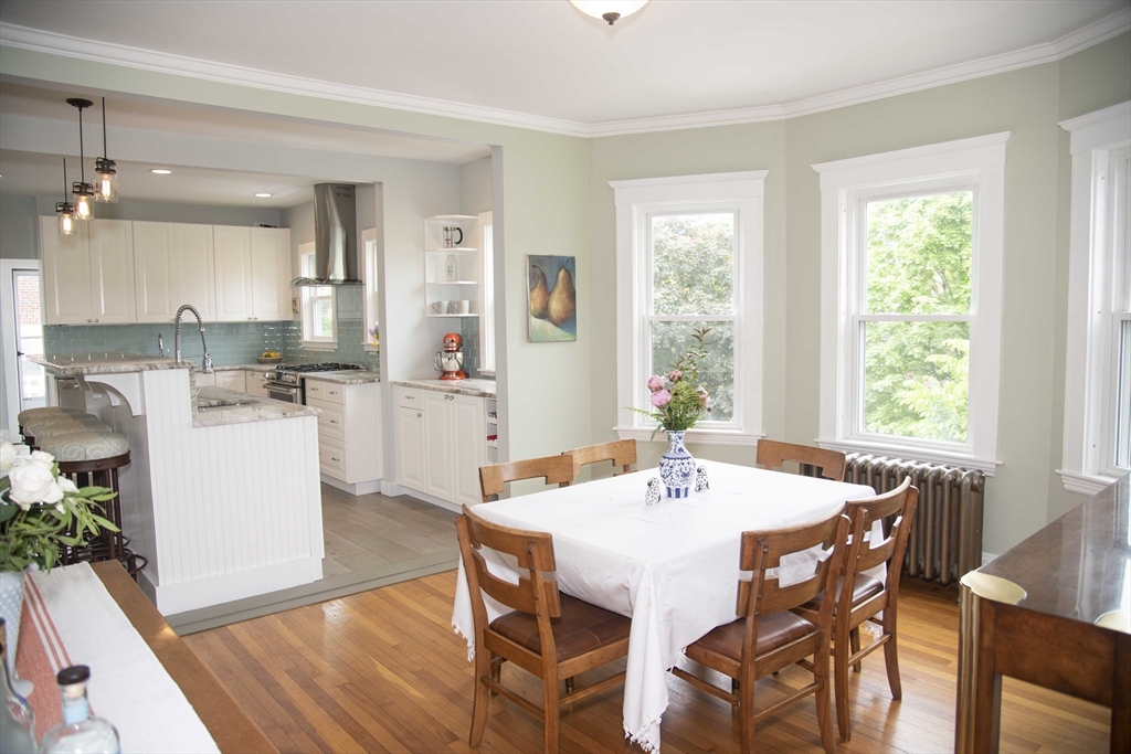 3 Chester Road, Unit 3 Belmont, MA 02478 - Photo 4 of 40 a view of a dining room with furniture and wooden floor