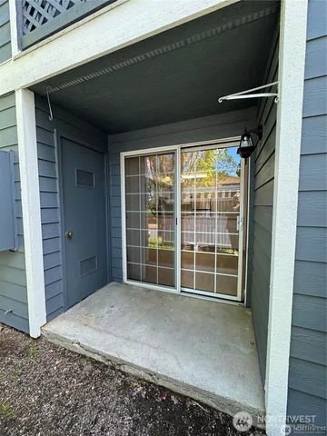 a view of a room with a large window