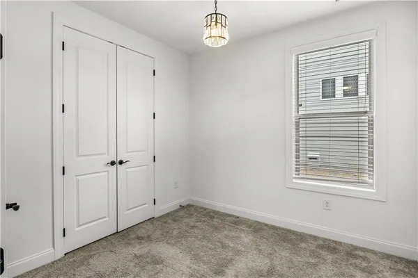 a view of an entryway with window