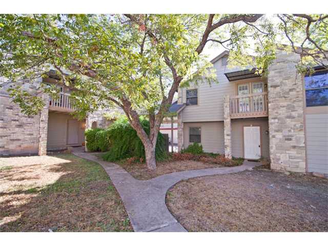 1804 Cinnamon Path Austin, TX 78704 - Photo 1 of 1 a front view of a house with a garden