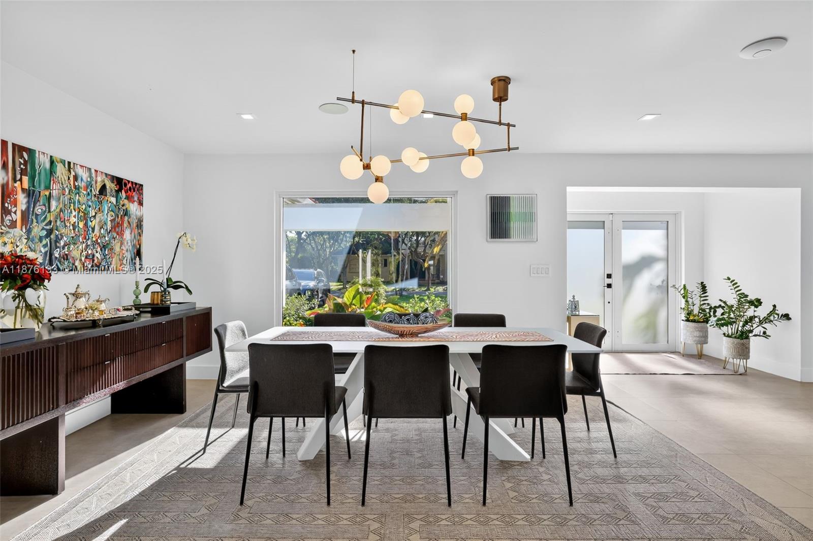 10740 Southwest 73rd Court Pinecrest, FL 33156 - Photo 13 of 37 a view of a dining room with furniture
