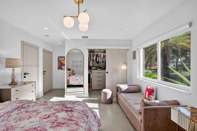 a living room with furniture and window