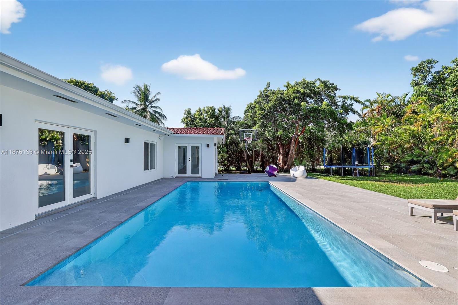 10740 Southwest 73rd Court Pinecrest, FL 33156 - Photo 32 of 37 a view of a house with entertaining space