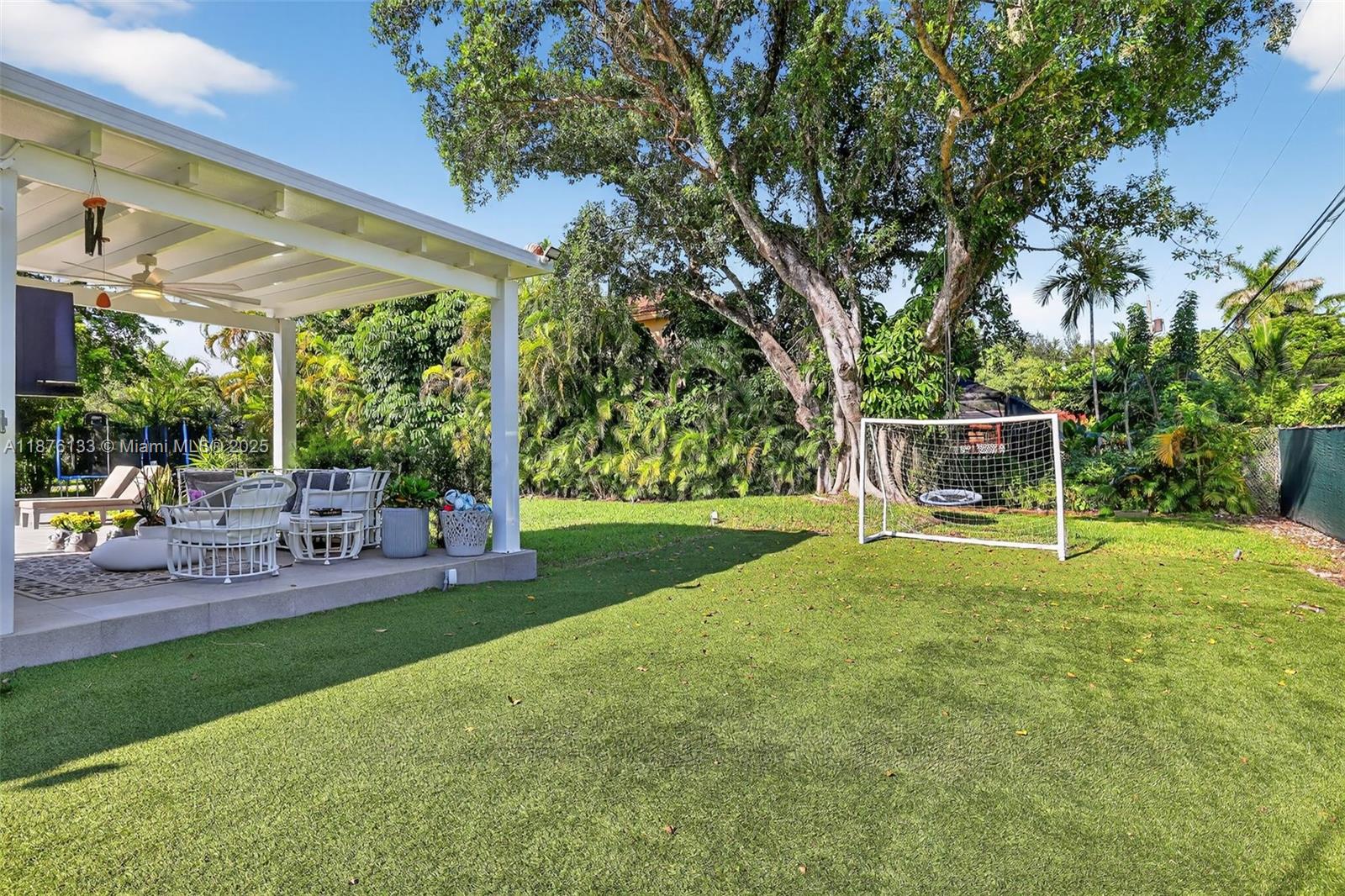 10740 Southwest 73rd Court Pinecrest, FL 33156 - Photo 34 of 37 a view of backyard with sitting area