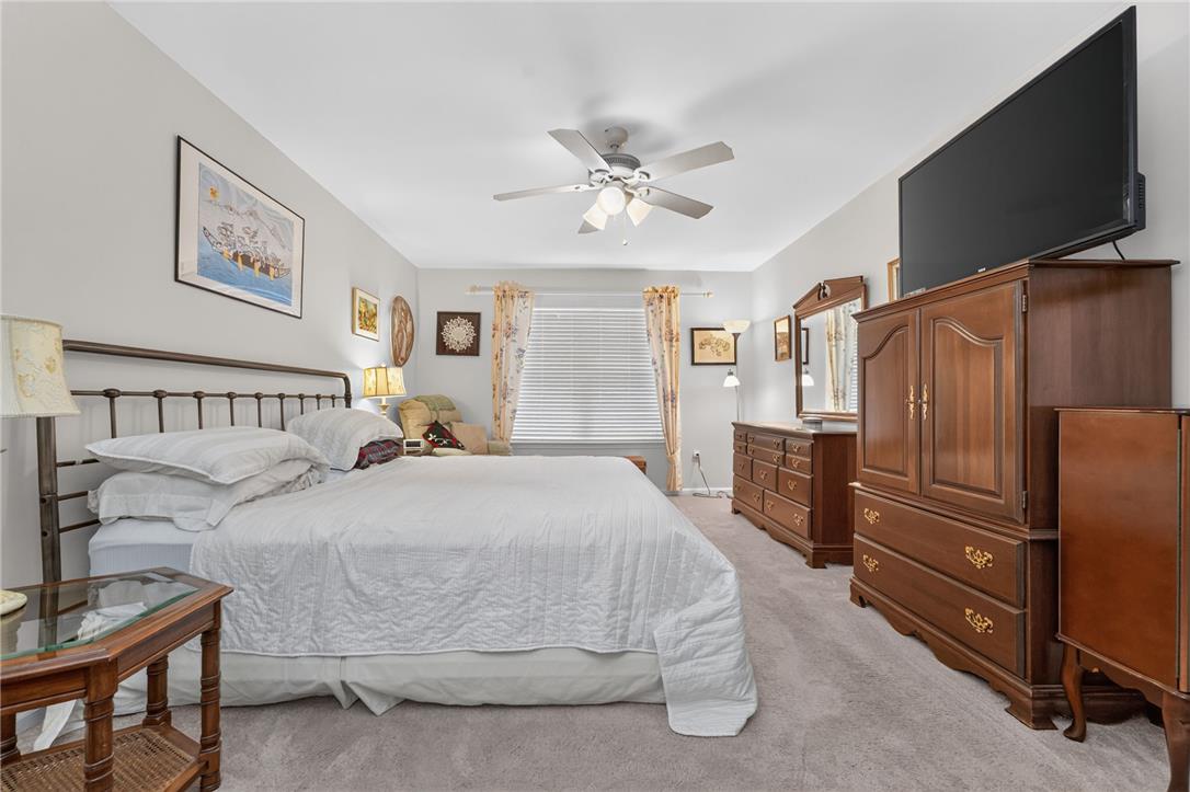 198 Park Ridge Drive Easton, PA 18040 - Photo 11 of 28 Comfortable bedroom with soft carpeting and ample natural light through window blinds.