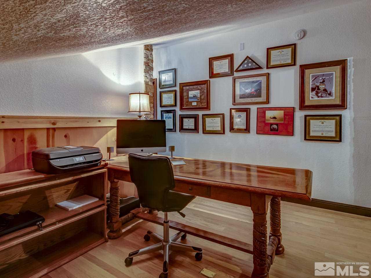 4125 Christy Way Reno, NV 89519 - Photo 17 of 23 a view of a workspace with furniture