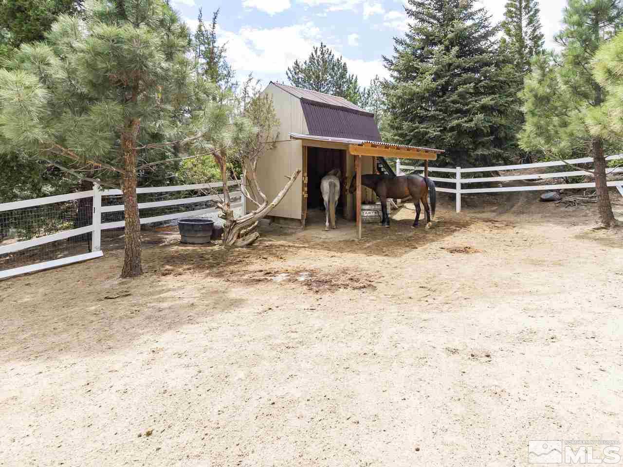 4125 Christy Way Reno, NV 89519 - Photo 18 of 23 a view of house with backyard and seating area