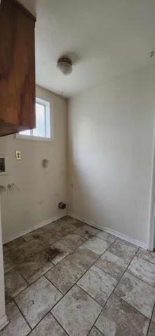 a view of a room with a window