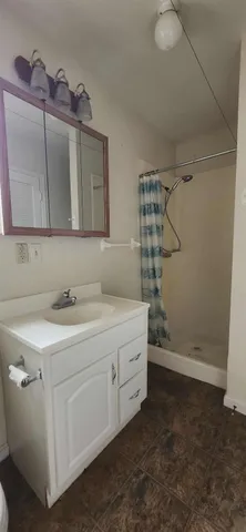 an empty room with a empty space and window