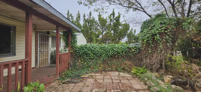 a backyard of a house with lots of green space