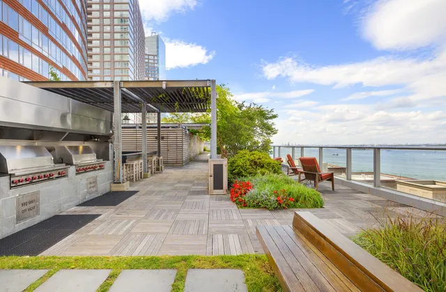 a utility room with sink dryer and washer
