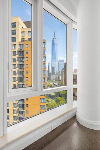 a kitchen with stainless steel appliances a stove top oven and cabinets