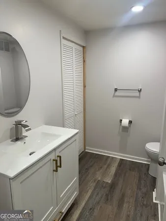 a bathroom with a sink and a toilet