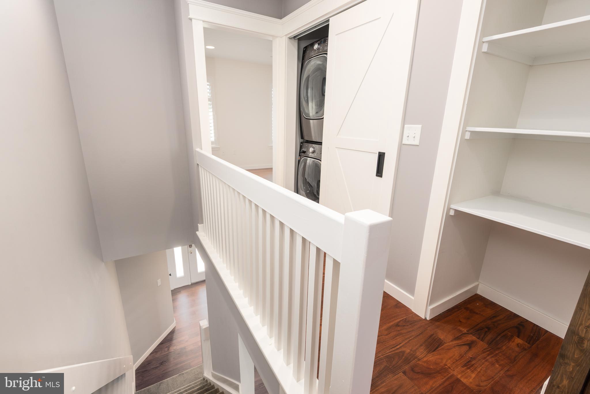 47 Queen Anne Way Chester, MD 21619 - Photo 25 of 44 a view of a hallway with wooden floor and entryway
