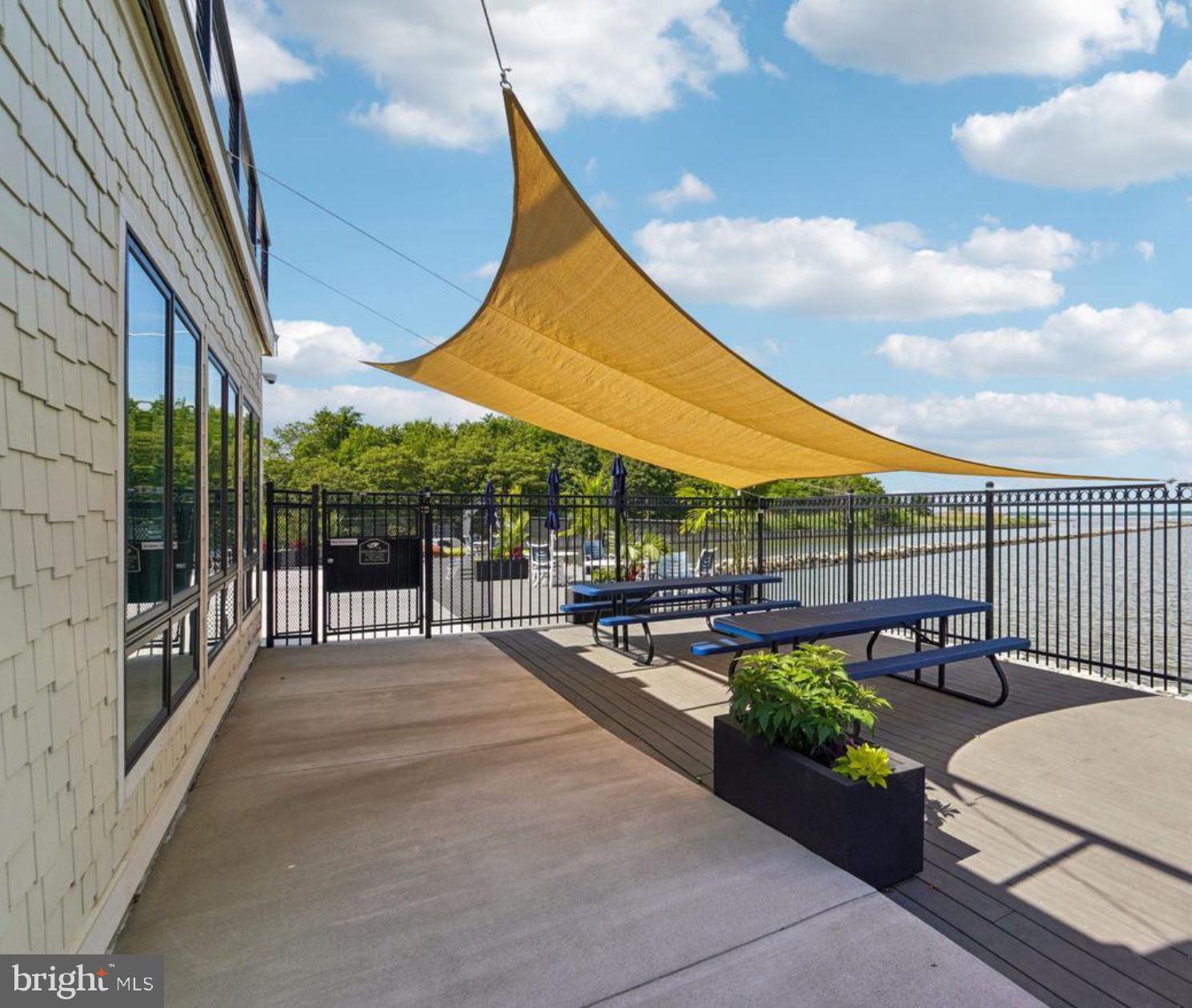 47 Queen Anne Way Chester, MD 21619 - Photo 44 of 44 a view of a patio with a table and chairs