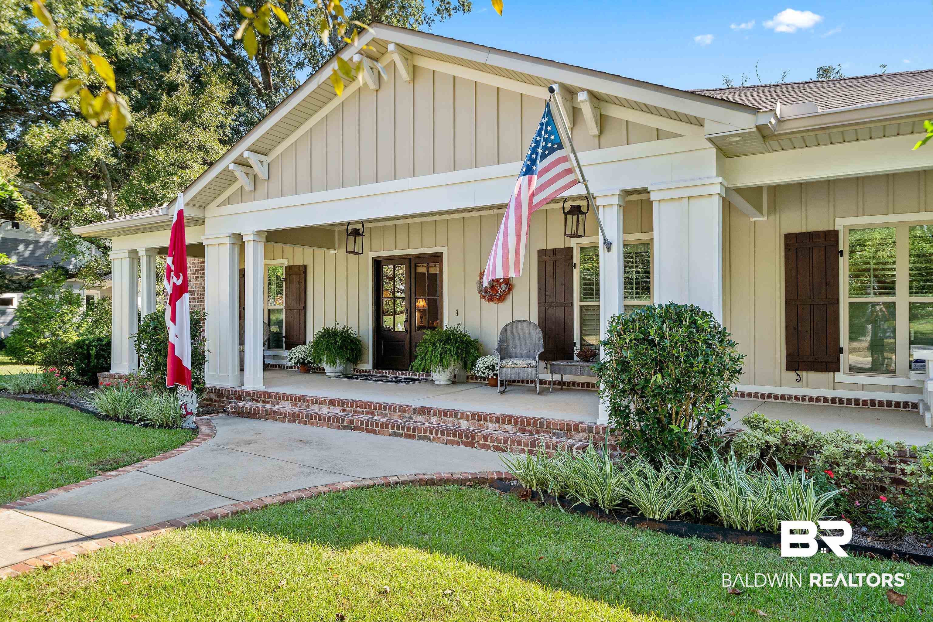 29530 St John Street Daphne, AL 36526 - Photo 2 of 38 View of front facade featuring a front lawn and a porch