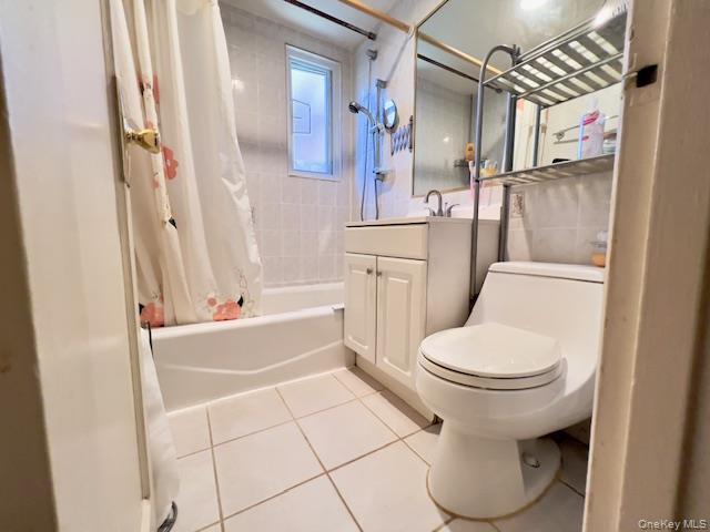 220-34 67th Avenue, Unit 2LEVELS Queens, NY 11364 - Photo 15 of 30 Full bathroom with tile patterned flooring, shower / bath combo, and vanity