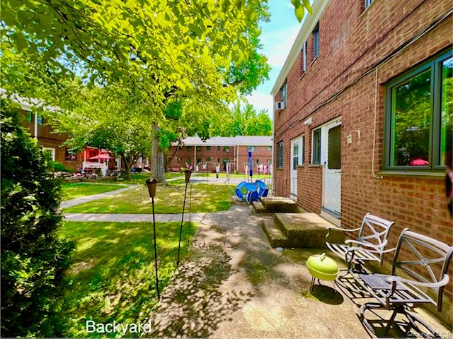 220-34 67th Avenue, Unit 2LEVELS Queens, NY 11364 - Photo 26 of 30 View of backyard