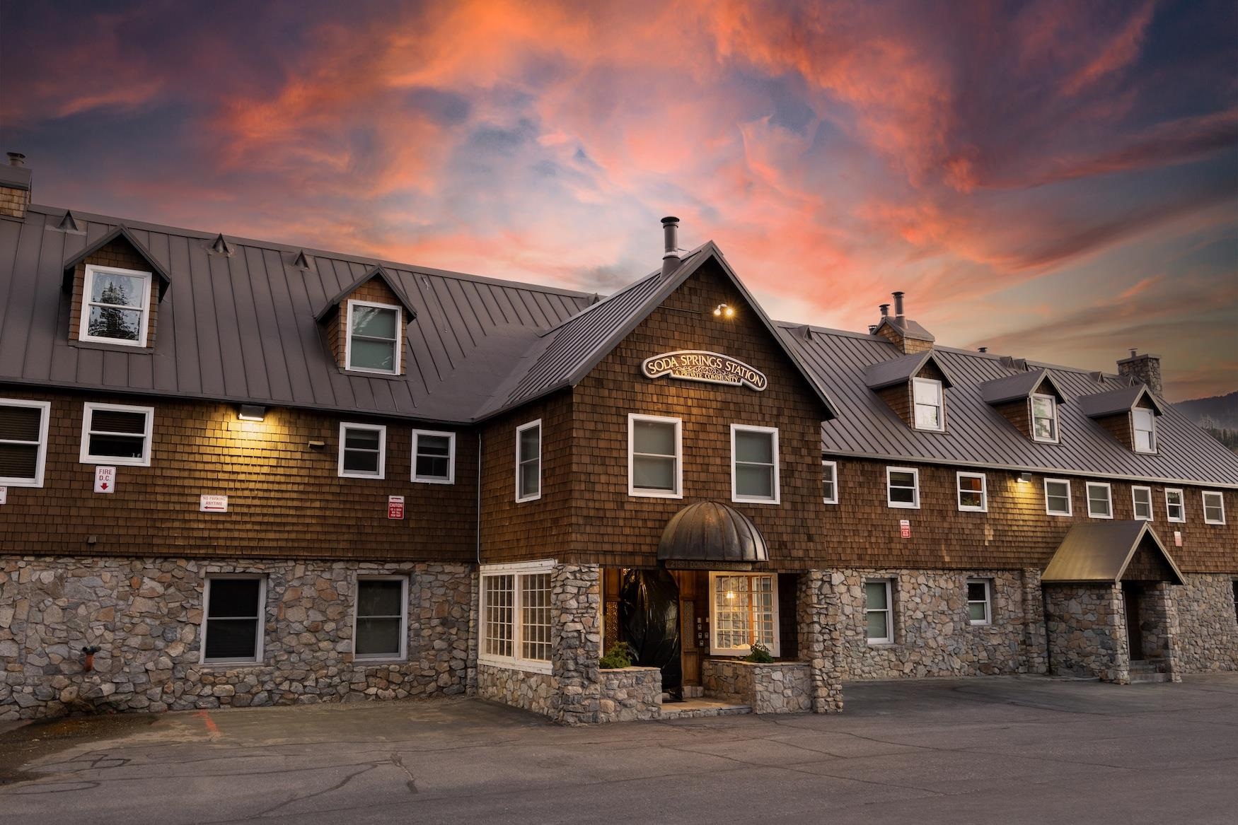 21501 Donner Pass Road, Unit 13 Soda Springs, CA 95728 - Photo 12 of 23 a front view of a house with a yard
