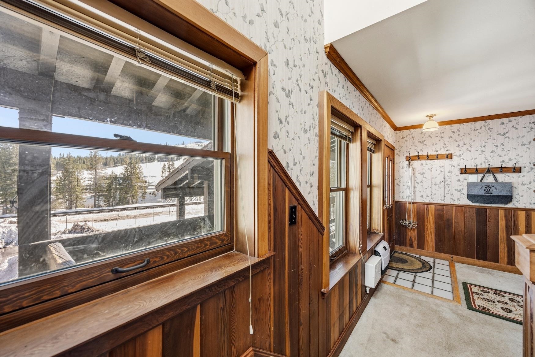 21501 Donner Pass Road, Unit 13 Soda Springs, CA 95728 - Photo 14 of 23 a view of a balcony with wooden floor and stairs