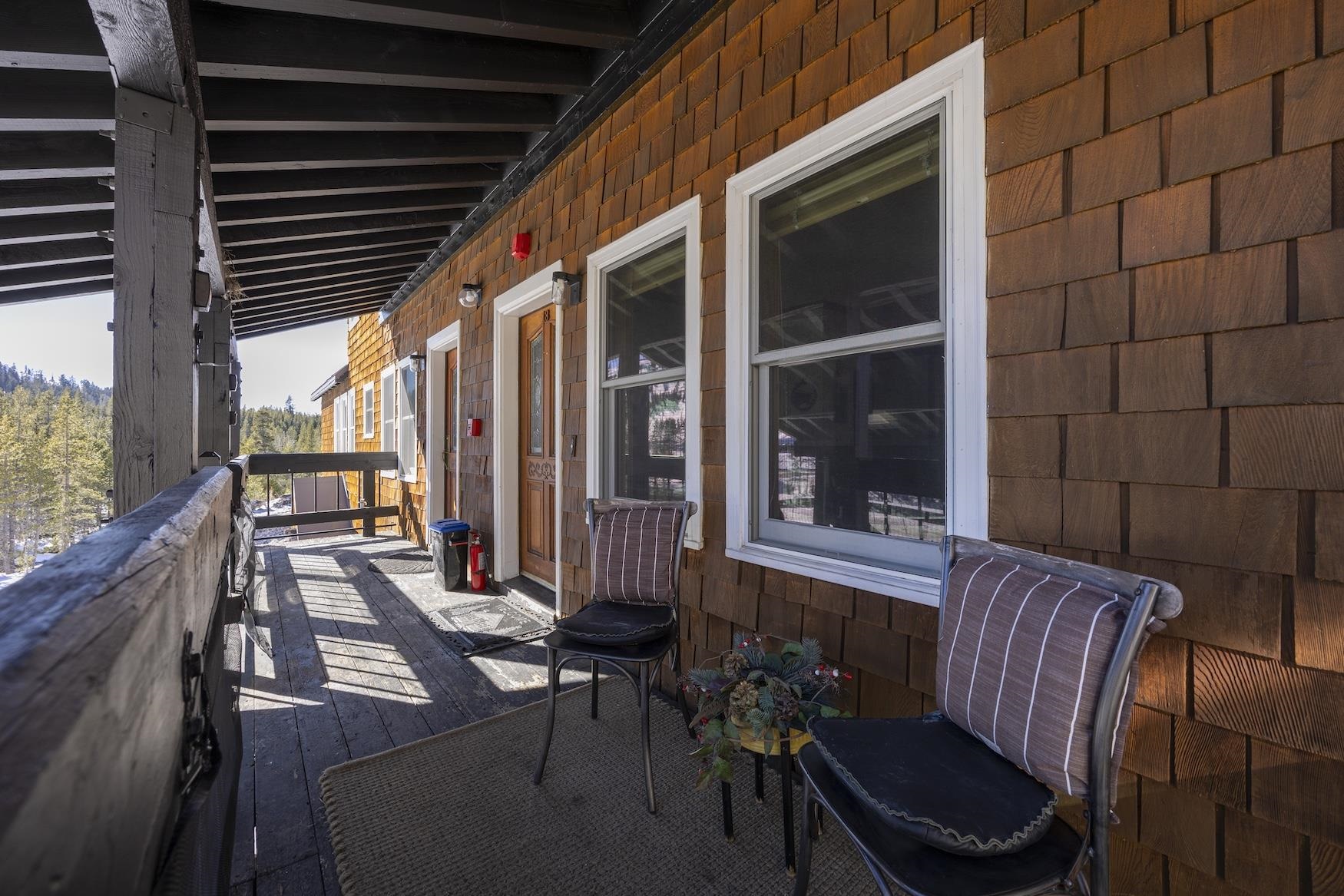 21501 Donner Pass Road, Unit 13 Soda Springs, CA 95728 - Photo 22 of 23 a view of two chairs in the balcony