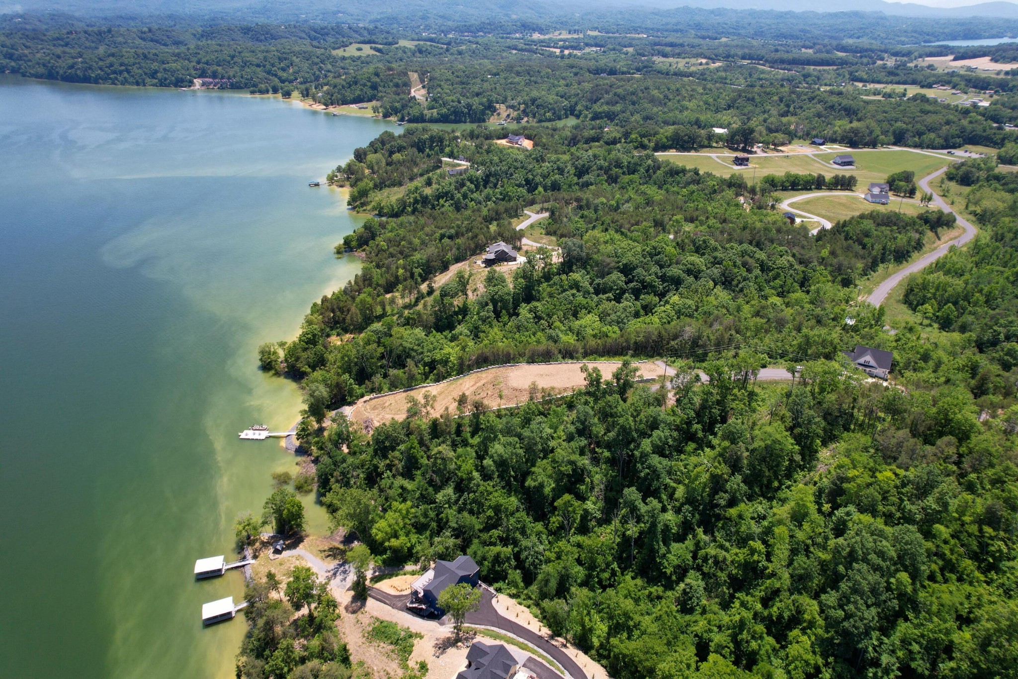 74 Clear Point Dandridge, TN 37725 - Photo 15 of 29 an aerial view of a house with a yard and lake view
