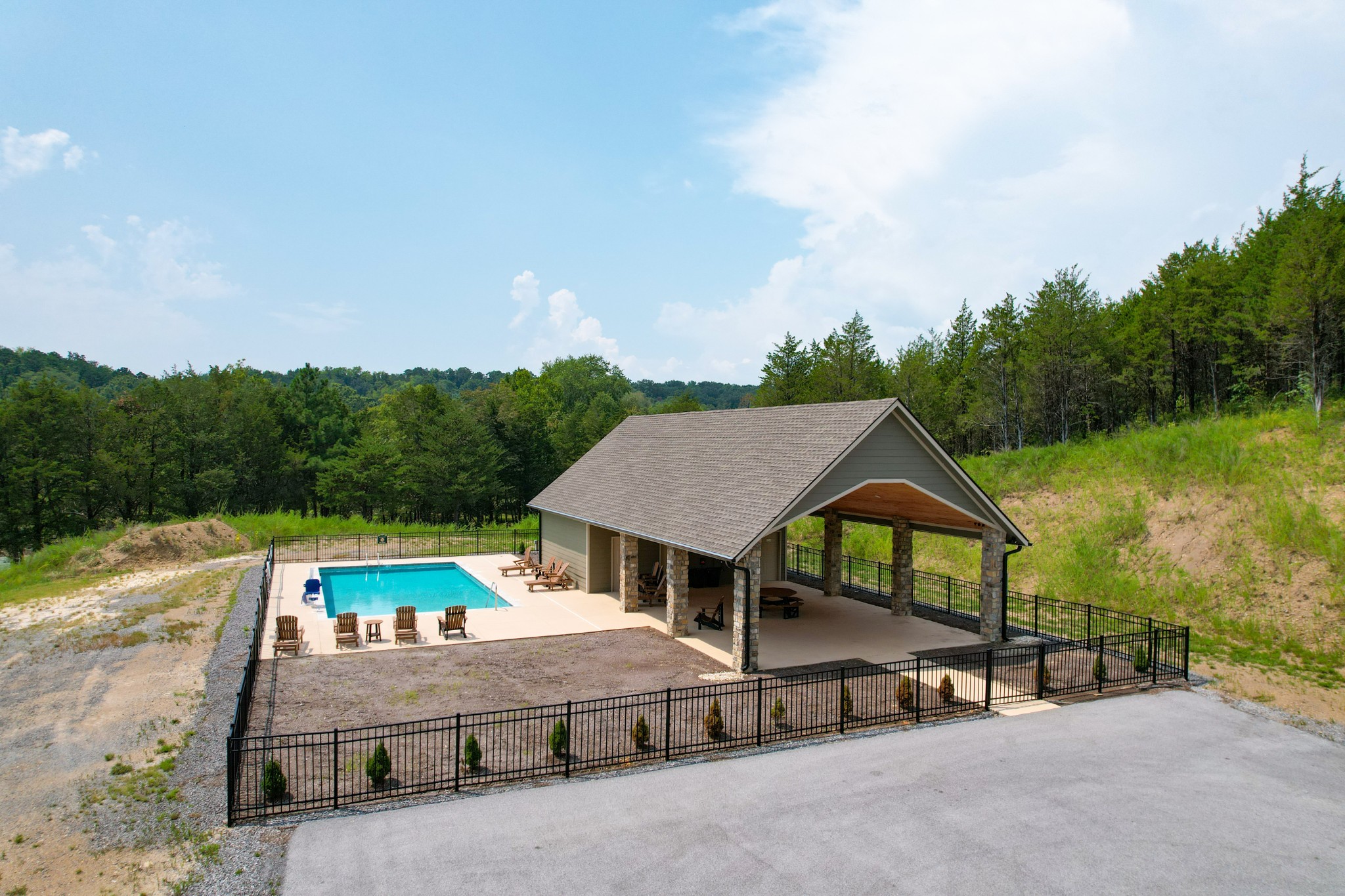 74 Clear Point Dandridge, TN 37725 - Photo 22 of 29 a view of a house with pool and a yard