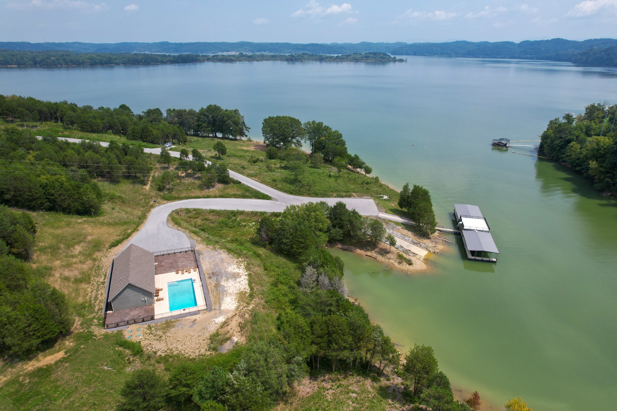 74 Clear Point Dandridge, TN 37725 - Photo 25 of 29 a aerial view of a house with a lake view