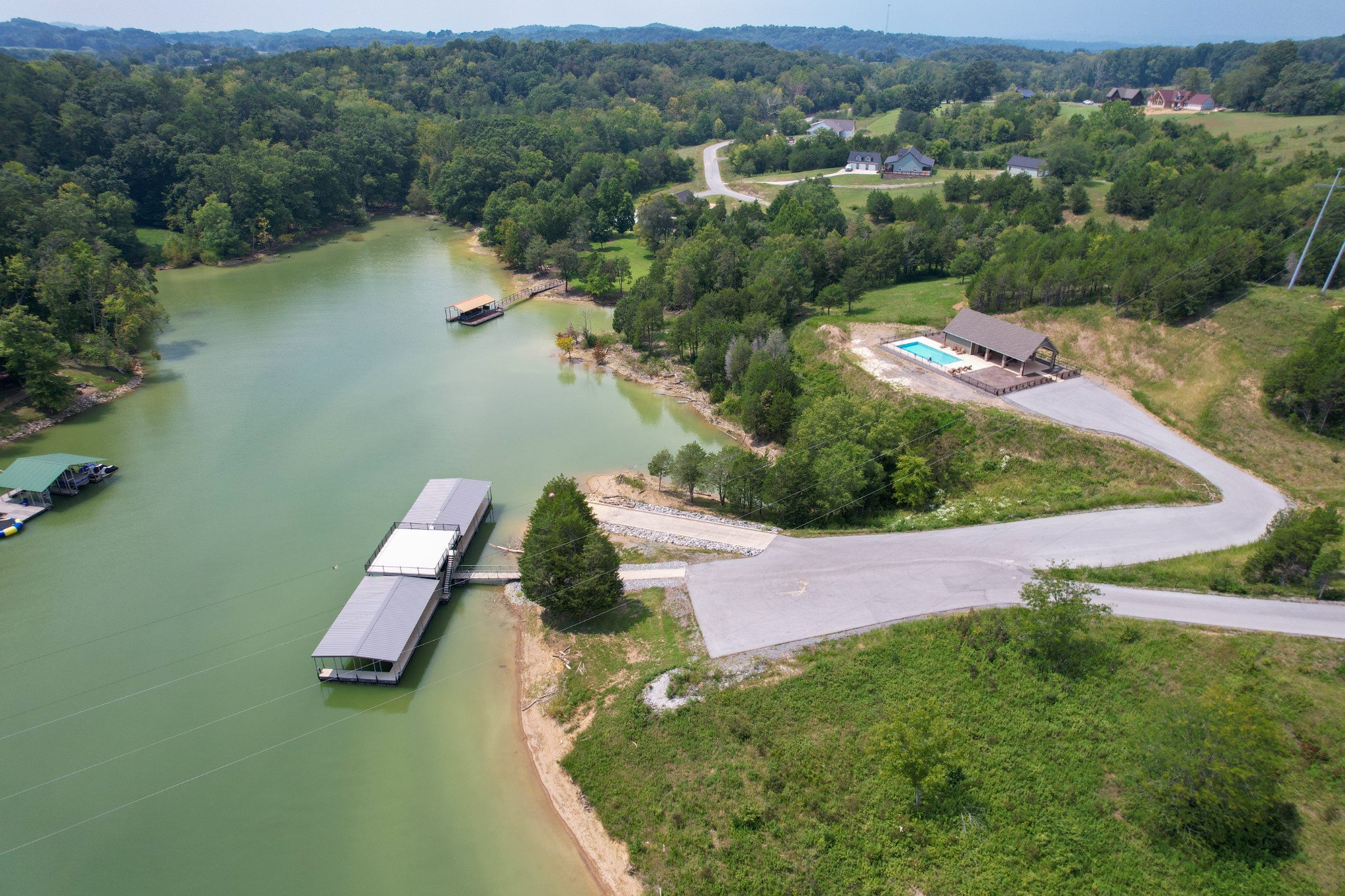 74 Clear Point Dandridge, TN 37725 - Photo 28 of 29 an aerial view of a house with a yard and lake view
