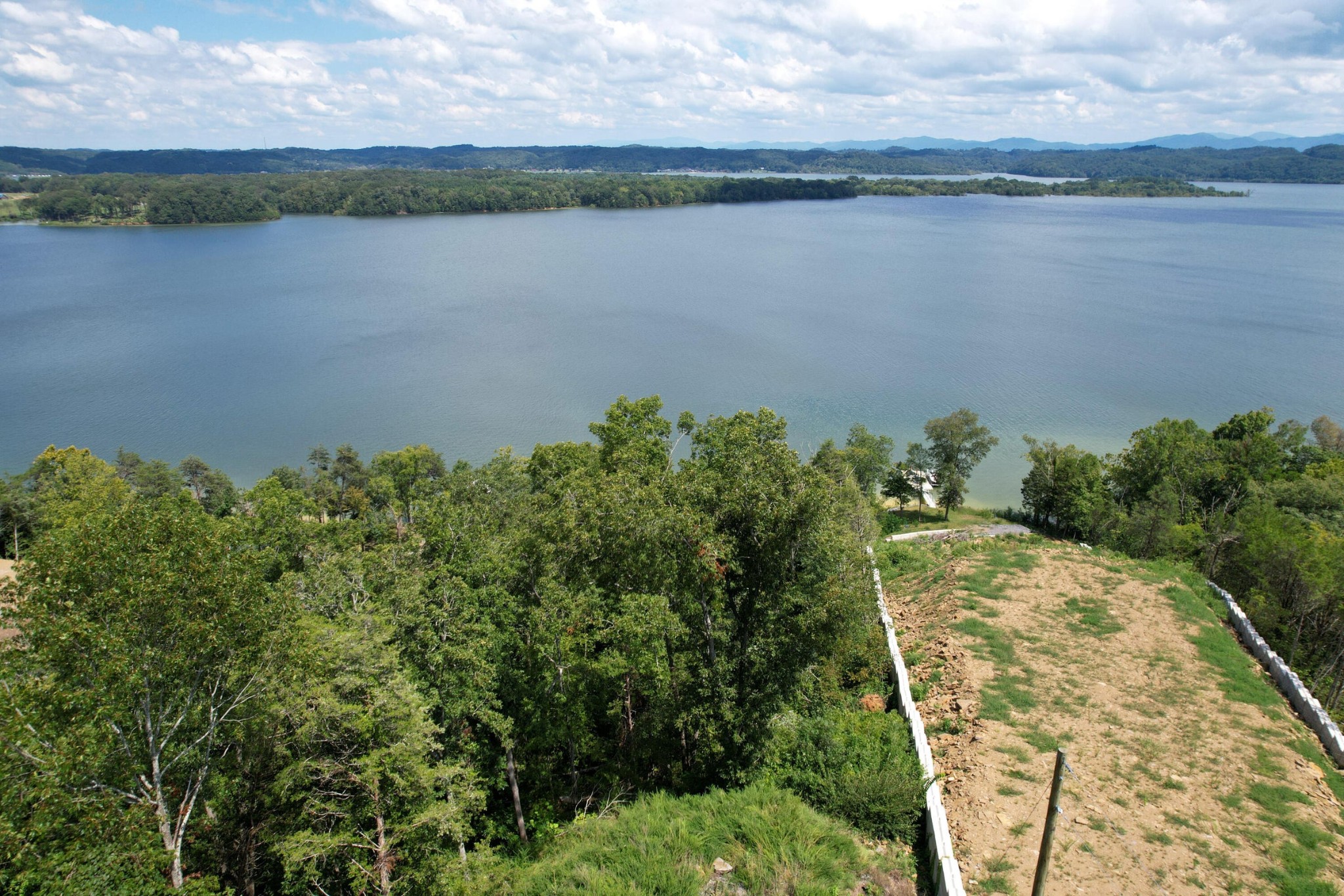 74 Clear Point Dandridge, TN 37725 - Photo 10 of 29 a view of a lake with outdoor space