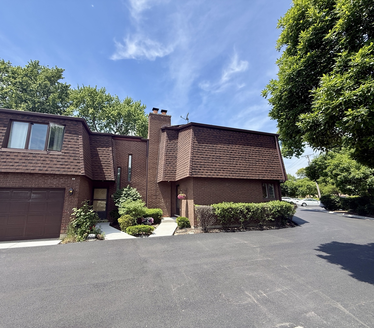 414 South Dee Road Park Ridge, IL 60068 - Photo 1 of 37 front view of a house with a street