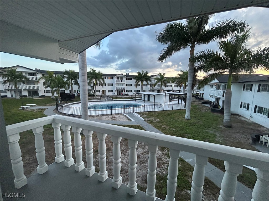 3706 Broadway, Unit 29 Fort Myers, FL 33901 - Photo 1 of 15 a view of a porch and yard