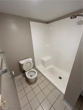 a bathroom with a sink and a shower