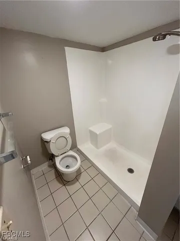 a bathroom with a sink and a shower