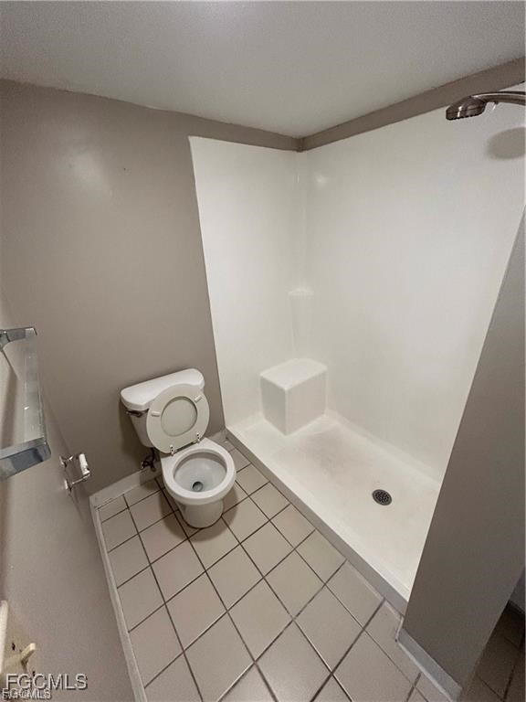 3706 Broadway, Unit 29 Fort Myers, FL 33901 - Photo 11 of 15 a bathroom with a sink and a shower