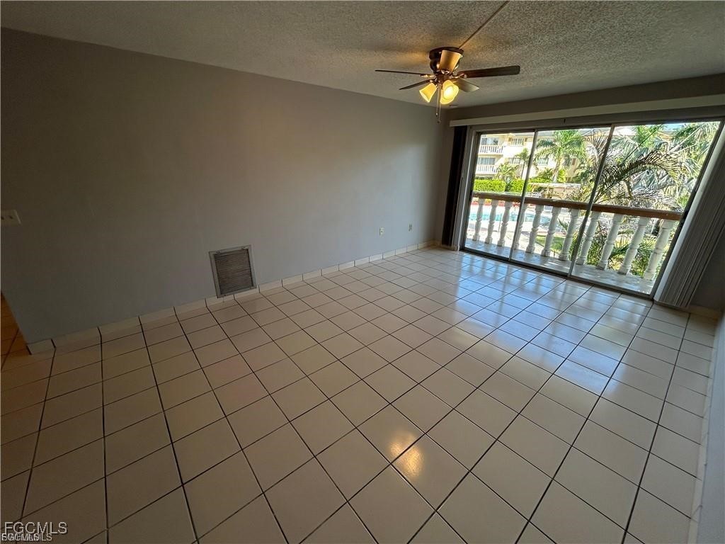 3706 Broadway, Unit 29 Fort Myers, FL 33901 - Photo 2 of 15 a view of an empty room and window