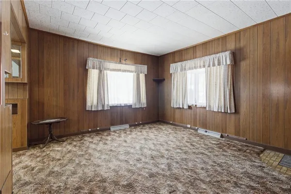 a view of an empty room and window