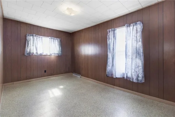 an empty room with windows