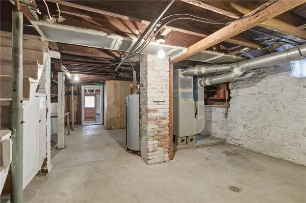 a view of a room with wooden walls