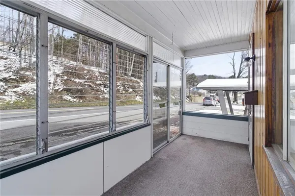 a view of a large room with a large window