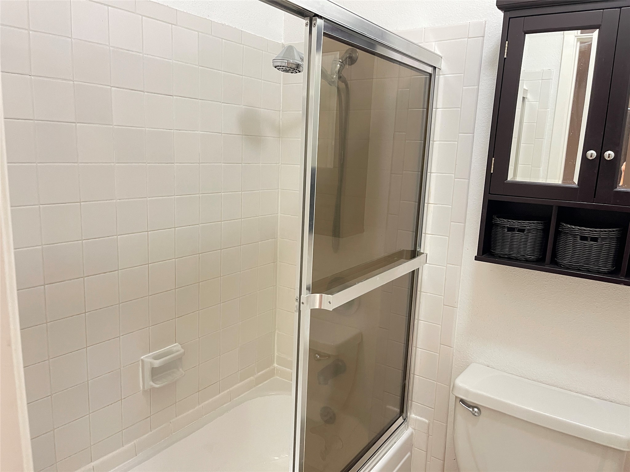 2800 Jeanetta Street, Unit 2204 Houston, TX 77063 - Photo 15 of 28 a bathroom with a shower and a sink