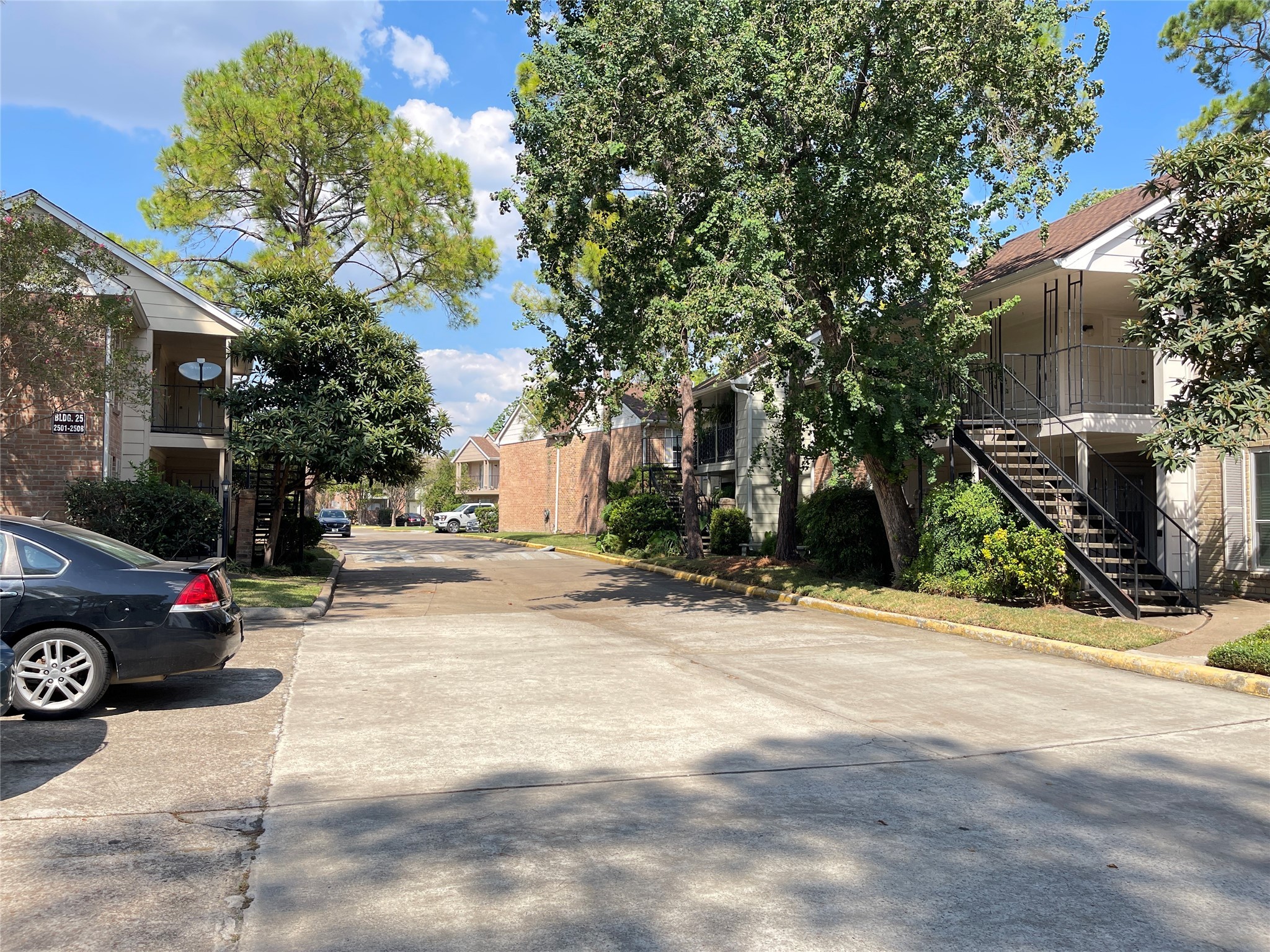 2800 Jeanetta Street, Unit 2204 Houston, TX 77063 - Photo 25 of 28 a view of street with parked cars