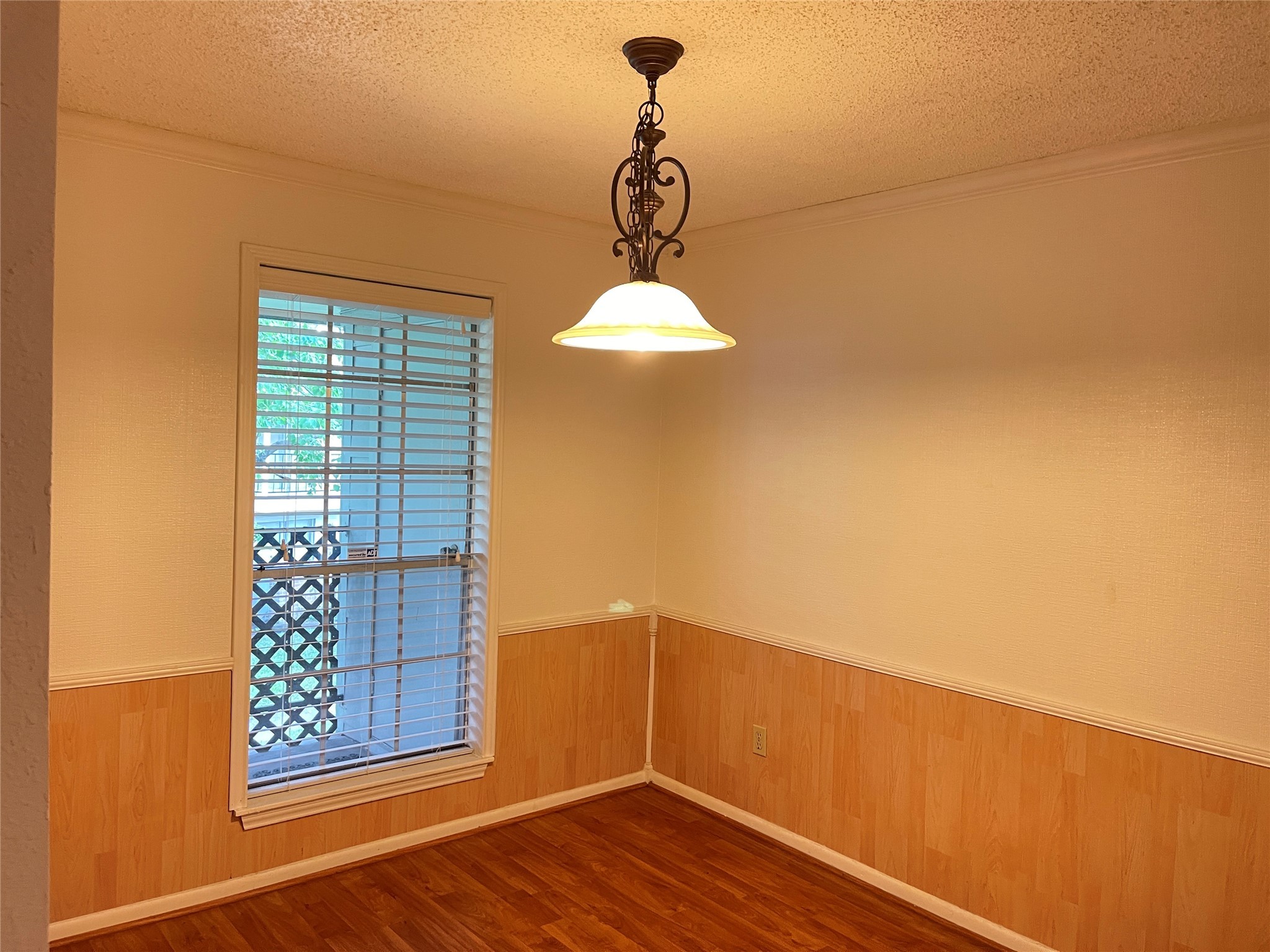 2800 Jeanetta Street, Unit 2204 Houston, TX 77063 - Photo 8 of 28 a view of empty room with wooden floor and fan